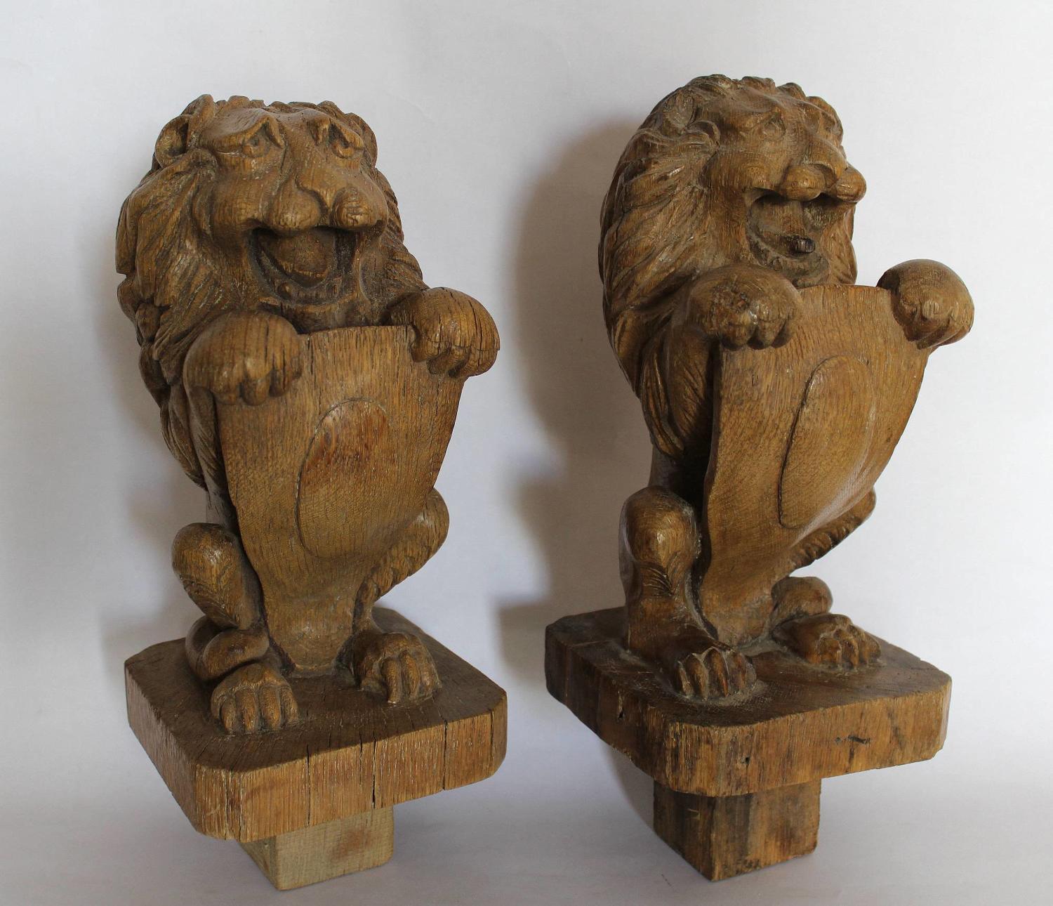 Pair of Carved Armorial Lion Newel Post Finials