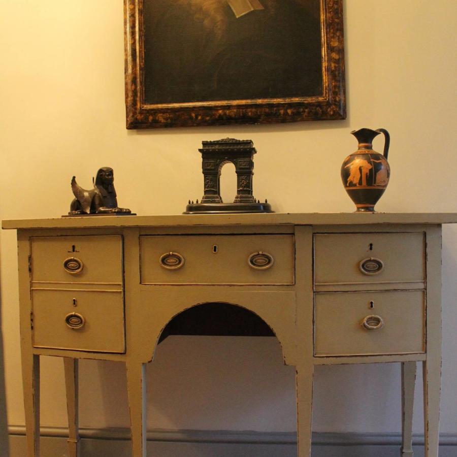 A Small Regency Bowfront Painted Mahogany Sideboard