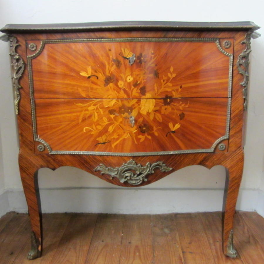 A Louis XV Style Kingwood Marquetry Commode with Gilt Metal Mounts