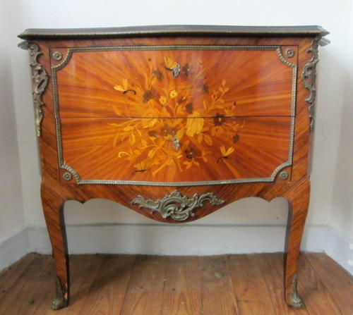 A Louis XV Style Kingwood Marquetry Commode with Gilt Metal Mounts
