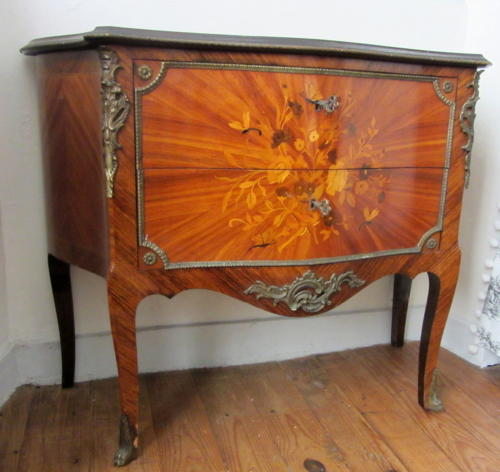 A Louis XV Style Kingwood Marquetry Commode with Gilt Metal Mounts