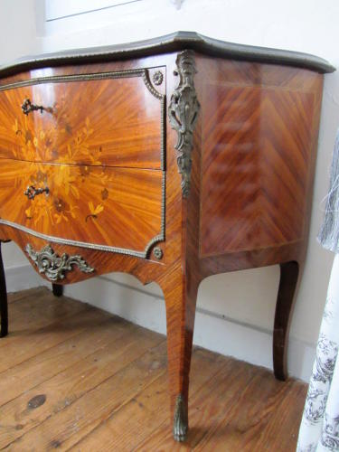 A Louis XV Style Kingwood Marquetry Commode with Gilt Metal Mounts