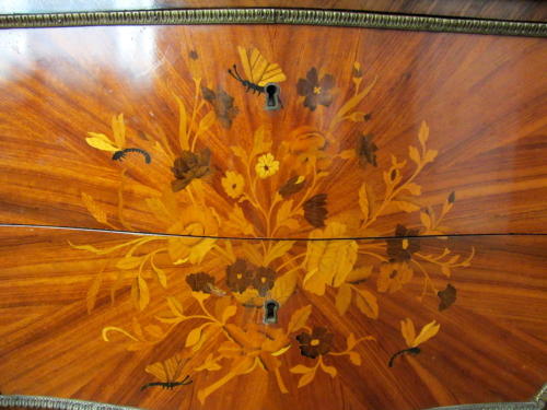 A Louis XV Style Kingwood Marquetry Commode with Gilt Metal Mounts