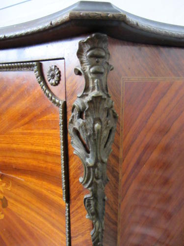 A Louis XV Style Kingwood Marquetry Commode with Gilt Metal Mounts