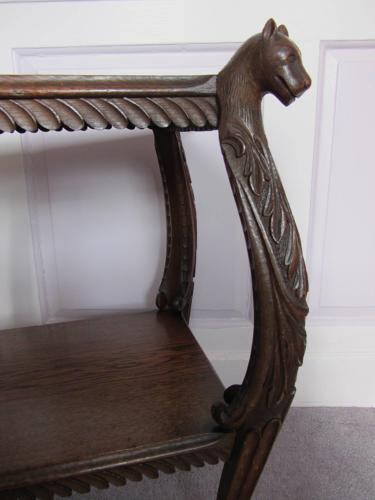 An Anglo-Indian Hardwood Side Table with Cats Head Terminals