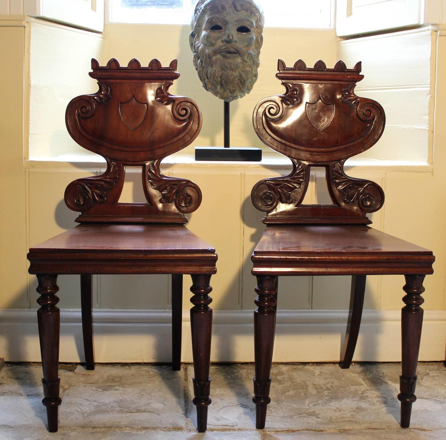 A Pair of George IV Mahogany Hall Chairs