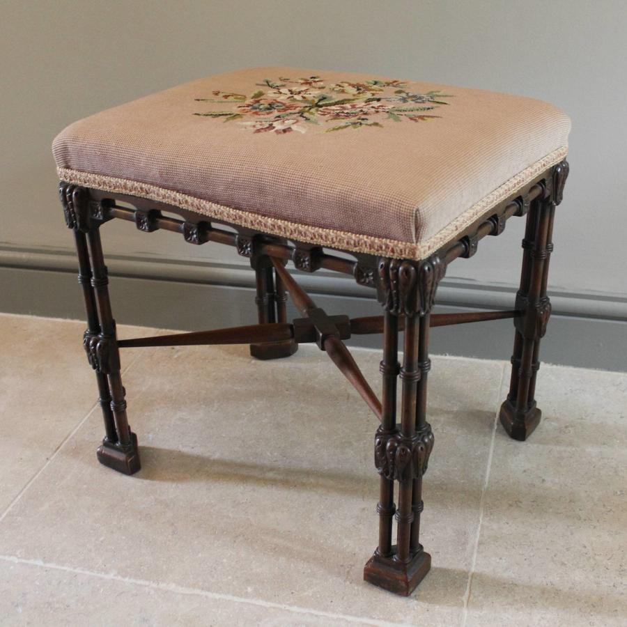 An Antique Mahogany Stool in Chippendale Style