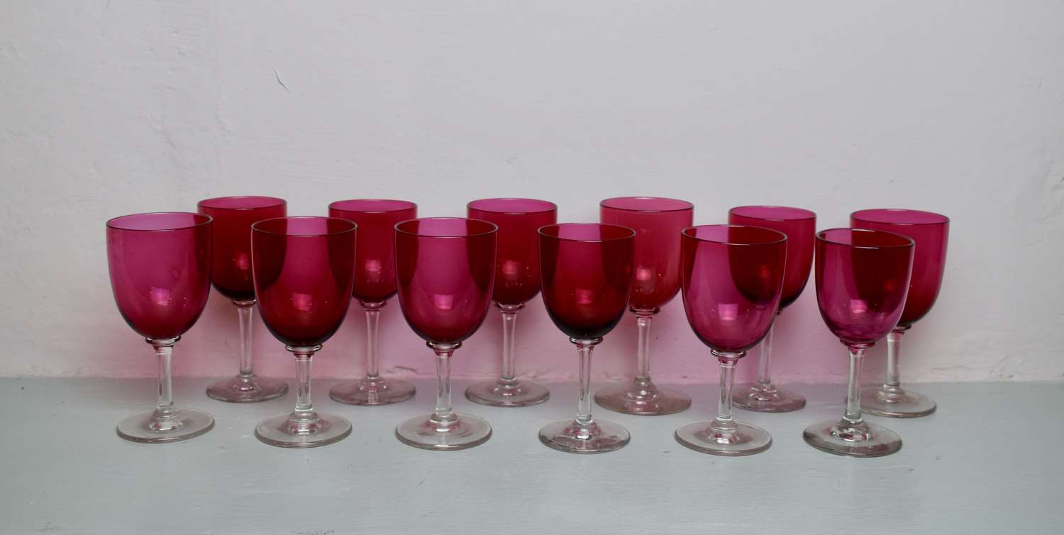 Twelve Victorian Cranberry Glass Drinking Glasses
