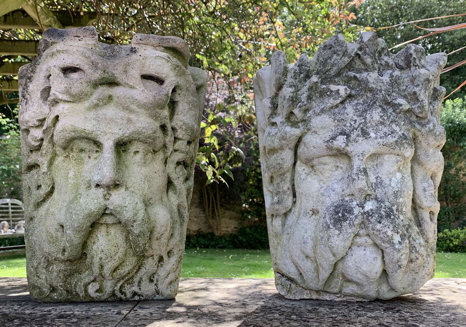 Pair of French Carved Stone Mascaron Keystones in Renaissance Style
