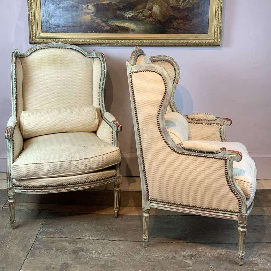 Pair of Antique French Louis XVI Style Painted Wing Armchairs