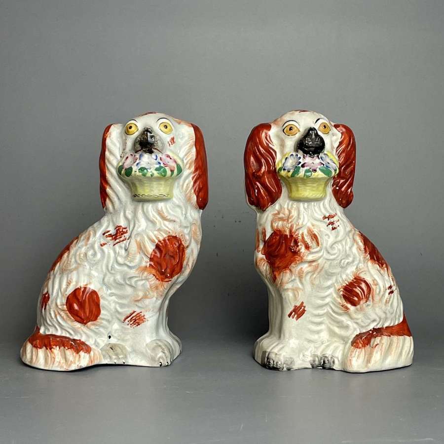 Pair of Victorian Staffordshire Dogs with Baskets of Flowers