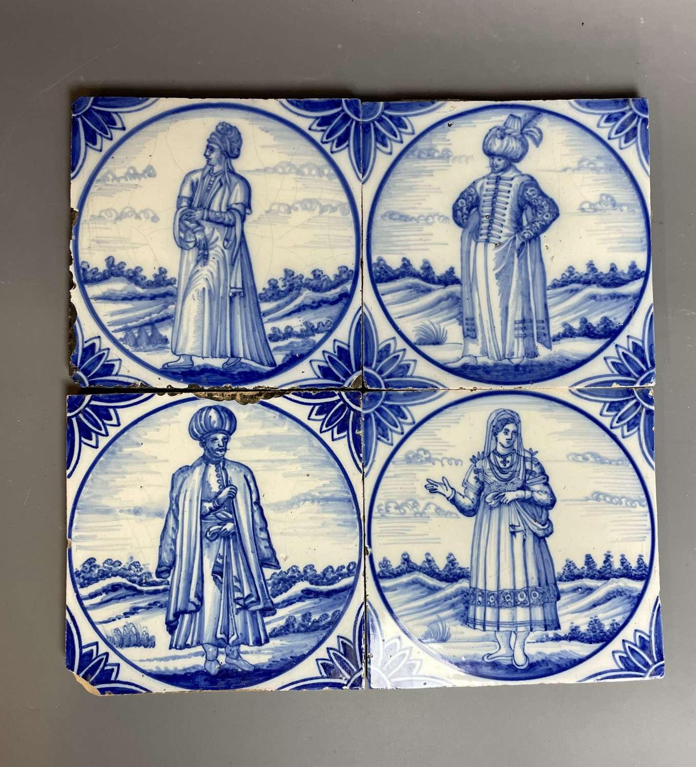 Set of Four Delft Tiles Painted with Figures in Turkish Costume