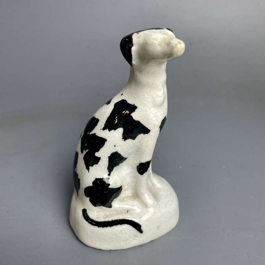 Victorian Miniature Staffordshire Model of a Seated Hound