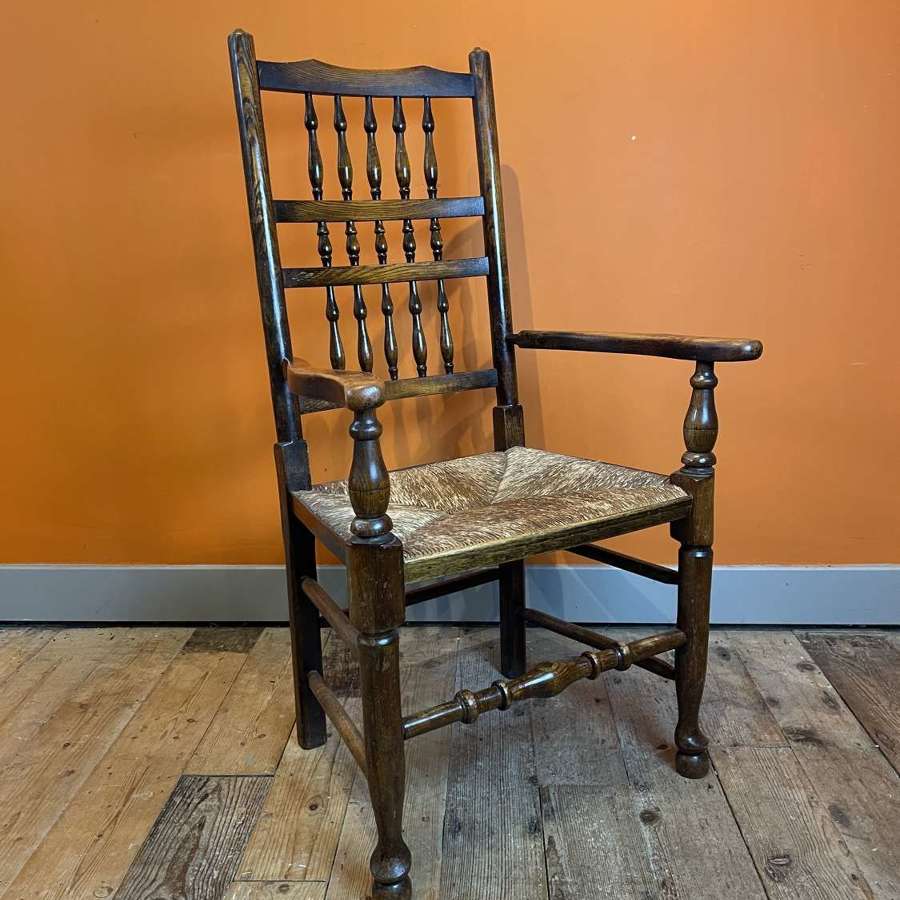 Edwardian Rush Seated Spindle Back Oak Armchair