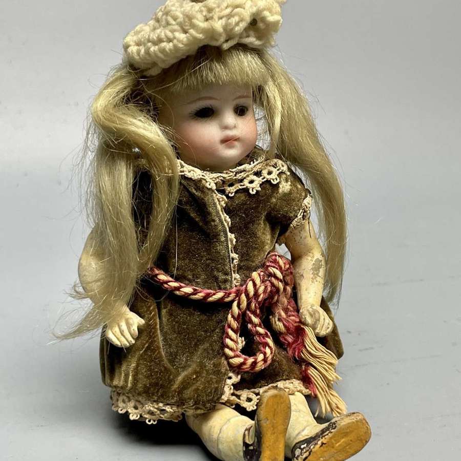 Small German Bisque Head Doll in Original Clothing