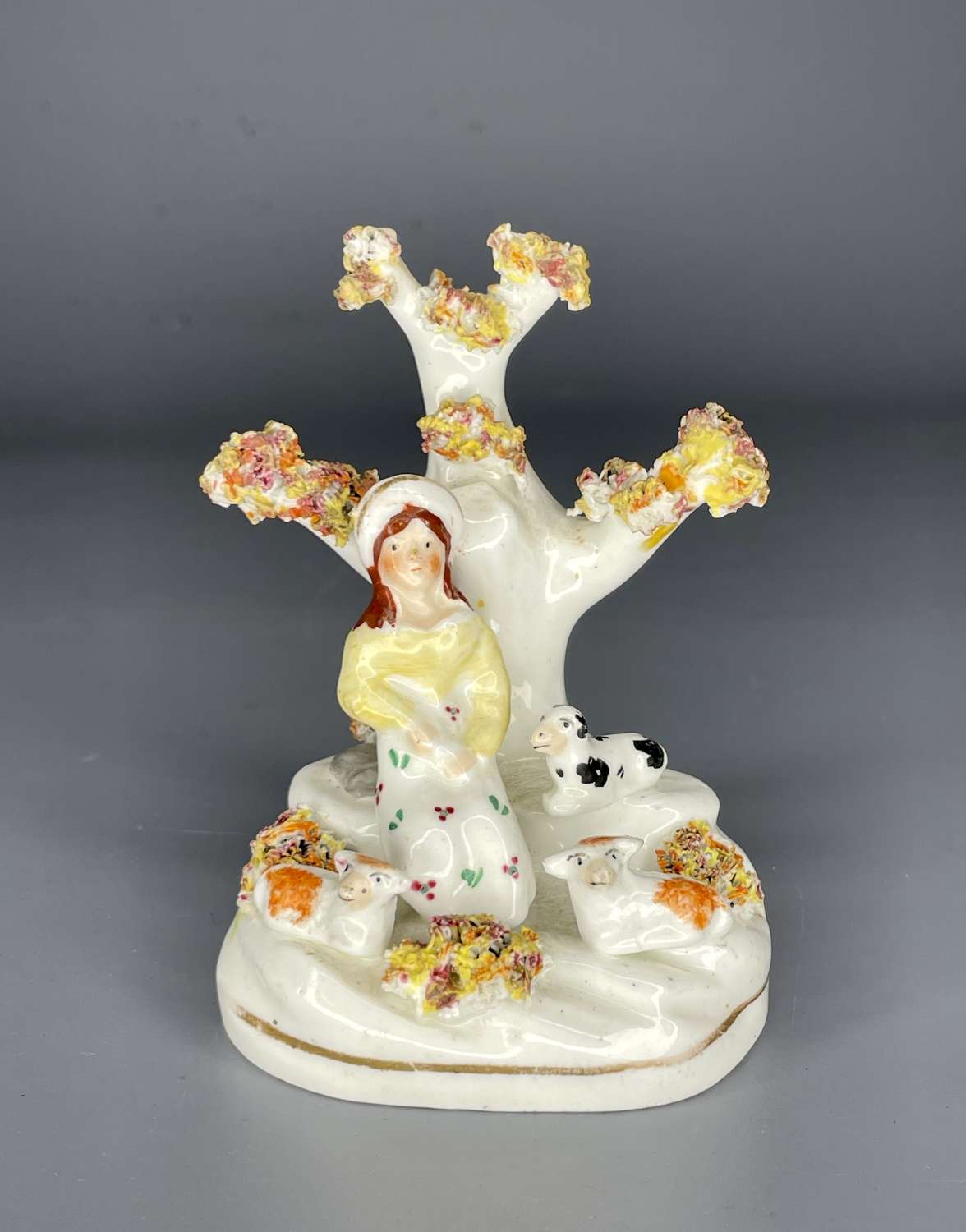 Victorian Staffordshire Porcelain Figure of a Shepherdess with Sheep