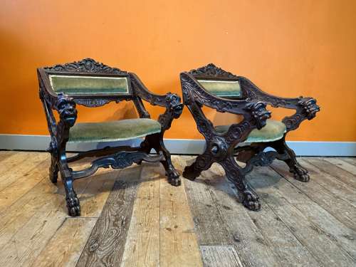 Pair of Continental Renaissance Style Carved Walnut Armchairs