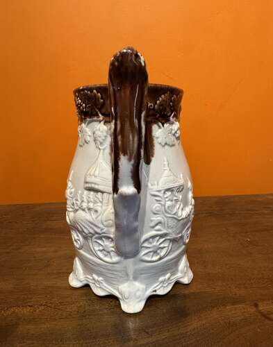 Victorian Yorkshire Pottery Jug Moulded with an Indian Carriage Scene