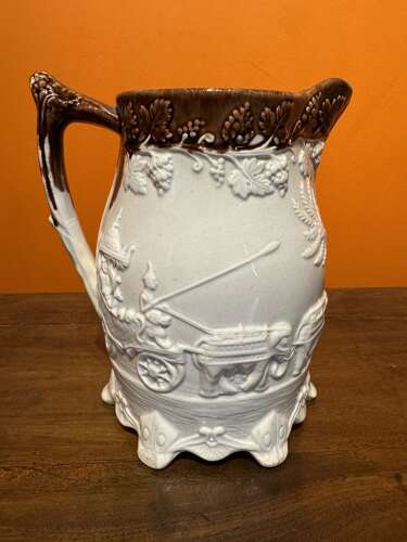 Victorian Yorkshire Pottery Jug Moulded with an Indian Carriage Scene